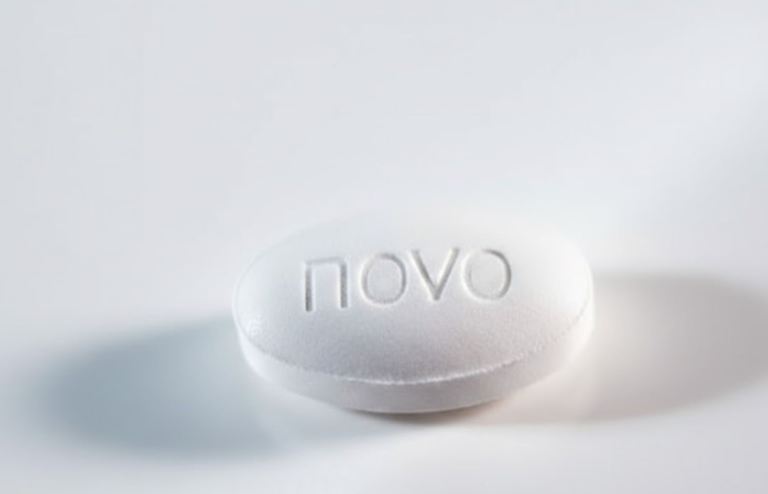 White oval pill with “novo” imprint on a clean white background.